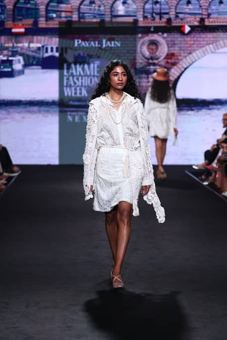 sachin and babi light blue dress The classic white canvas paired with vibrant royal blue and orange details.  The patola patterns are so breathtaking.  A truly one of a kind piece.  Outfits Designed by @palkindziner with 